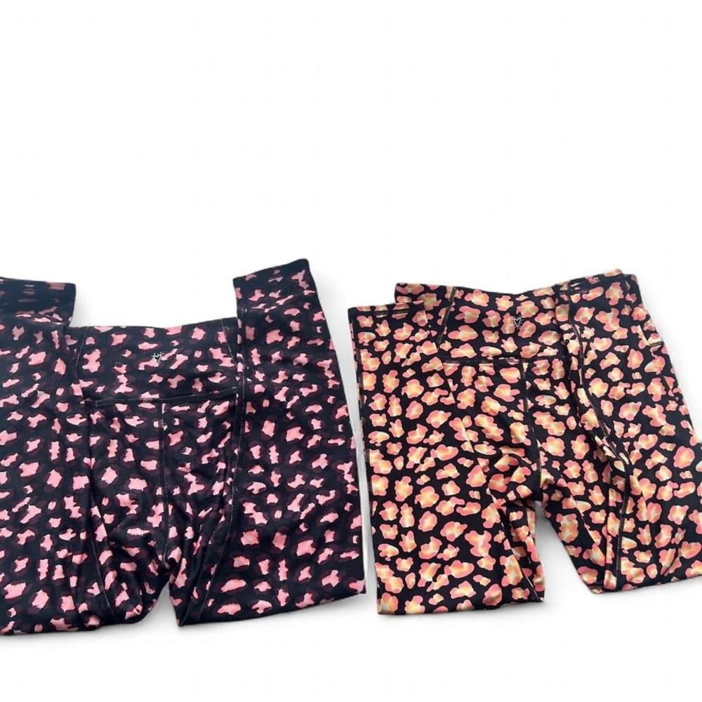 2 Pairs Betsy Johnson animal print leggings size medium EUC Black/Pink